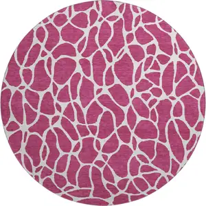Photo of 8' Blush And Ivory Geometric Washable Round Rug With UV Protection