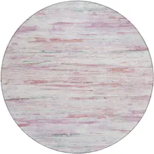 Photo of 8' Blush And Ivory Round Abstract Washable Indoor Outdoor Area Rug