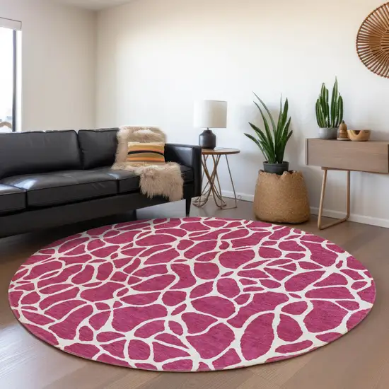 8' Blush And Ivory Round Geometric Washable Indoor Outdoor Area Rug Photo 7