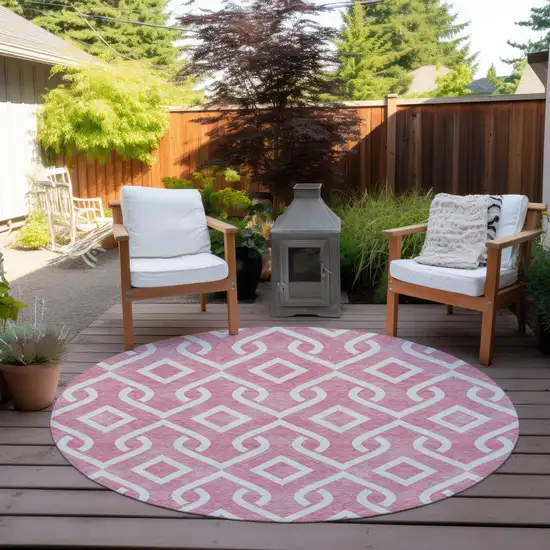 8' Blush And Ivory Round Geometric Washable Indoor Outdoor Area Rug Photo 6