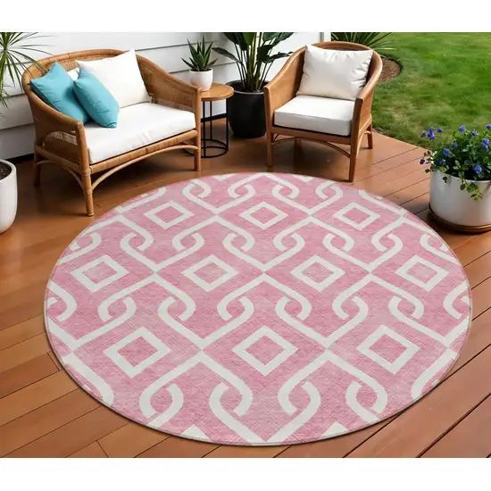 8' Blush And Ivory Round Geometric Washable Indoor Outdoor Area Rug Photo 1