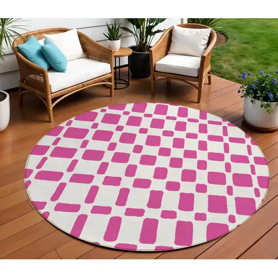 8' Blush And Ivory Round Geometric Washable Indoor Outdoor Area Rug Photo 1