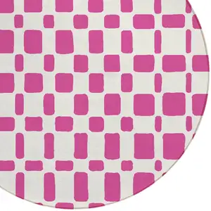 Photo of 8' Blush And Ivory Round Geometric Washable Indoor Outdoor Area Rug