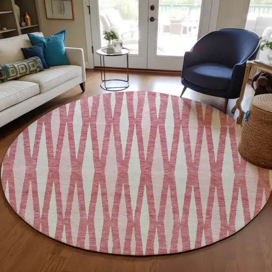 8' Blush And Ivory Round Geometric Washable Indoor Outdoor Area Rug Photo 8