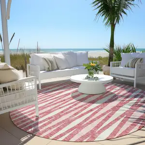 Photo of 8' Blush And Ivory Round Geometric Washable Indoor Outdoor Area Rug