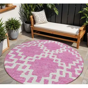 Photo of 8' Blush And Ivory Round Geometric Washable Indoor Outdoor Area Rug