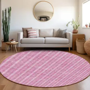 Photo of 8' Blush And Ivory Round Striped Washable Indoor Outdoor Area Rug