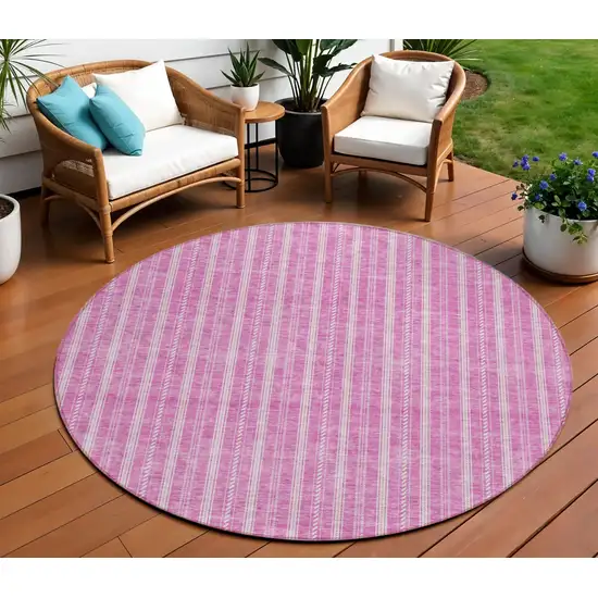 8' Blush And Ivory Round Striped Washable Indoor Outdoor Area Rug Photo 1
