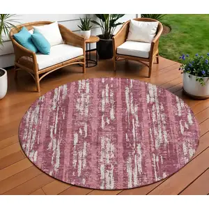 Photo of 8' Blush And Ivory Round Striped Washable Indoor Outdoor Area Rug