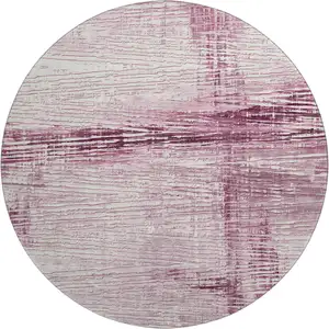 Photo of 8' Blush And Ivory Striped Washable Round Rug With UV Protection