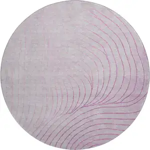 Photo of 8' Blush And Linen Abstract Washable Round Rug With UV Protection