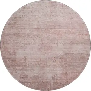 Photo of 8' Blush And Mauve Abstract Washable Round Rug With UV Protection