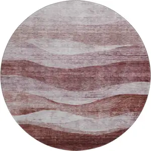 Photo of 8' Blush And Pink Abstract Washable Round Rug With UV Protection