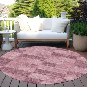 Photo of 8' Blush And Pink Round Geometric Washable Indoor Outdoor Area Rug