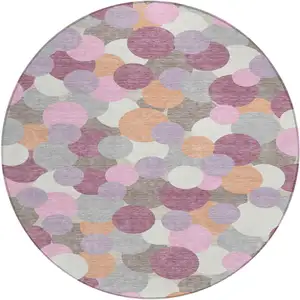Photo of 8' Blush And Pink Round Geometric Washable Indoor Outdoor Area Rug
