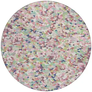 Photo of 8' Blush And Pink Round Geometric Washable Indoor Outdoor Area Rug