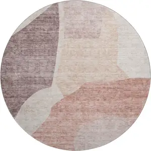 Photo of 8' Blush And Plum Abstract Washable Round Rug With UV Protection