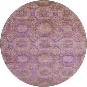 Photo of 8' Blush And Purple Abstract Geometric Washable Round Rug With UV Protection