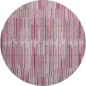 Photo of 8' Blush And Silver Striped Washable Round Rug With UV Protection