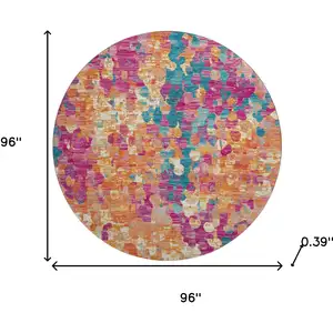 Photo of 8' Blush And Teal Abstract Washable Round Rug With UV Protection