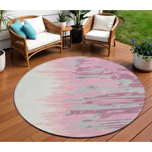 Photo of 8' Blush Beige And Gray Round Abstract Washable Indoor Outdoor Area Rug
