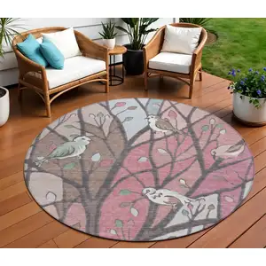Photo of 8' Blush Blue And Brown Round Botanical Leaves Washable Indoor Outdoor Area Rug