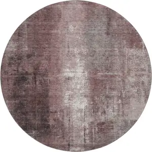 Photo of 8' Blush Charcoal And Ivory Abstract Washable Round Rug With UV Protection