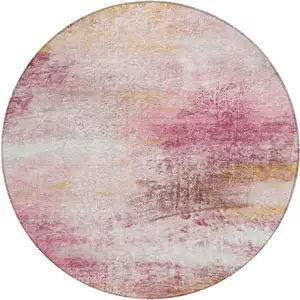 Photo of 8' Blush Gold And Ivory Round Abstract Washable Indoor Outdoor Area Rug