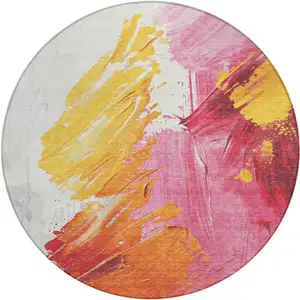 Photo of 8' Blush Gold And Orange Round Abstract Washable Indoor Outdoor Area Rug