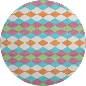 Photo of 8' Blush Green And Teal Geometric Washable Round Rug With UV Protection