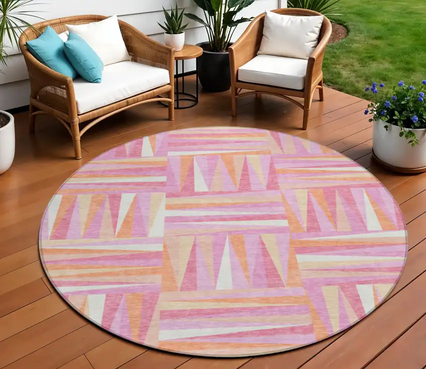 8' Blush Ivory And Orange Round Geometric Washable Indoor Outdoor Area Rug Photo 1