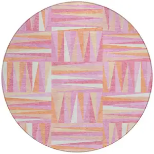 Photo of 8' Blush Ivory And Orange Round Geometric Washable Indoor Outdoor Area Rug