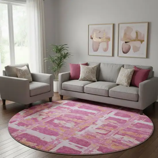 8' Blush Ivory And Orange Striped Washable Round Rug With UV Protection Photo 1