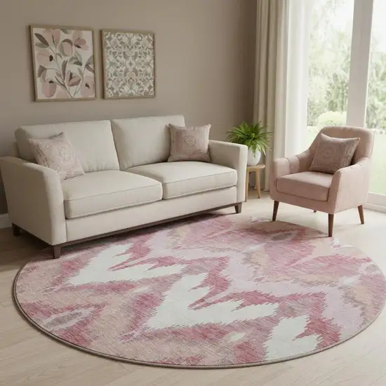 8' Blush Ivory And Pink Ikat Washable Round Rug With UV Protection Photo 1