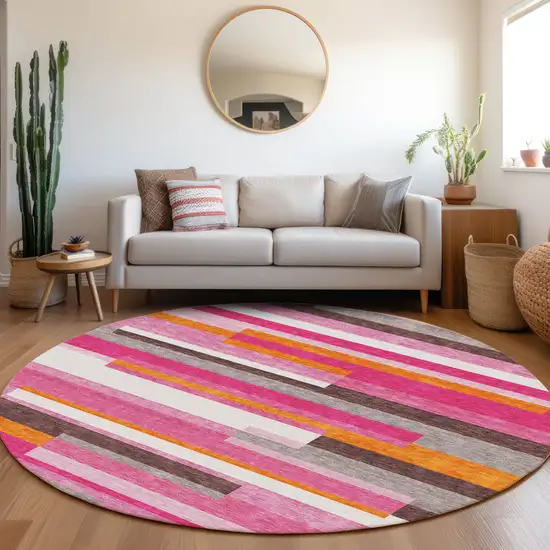 8' Blush Orange And Gray Striped Washable Round Rug With UV Protection Photo 4