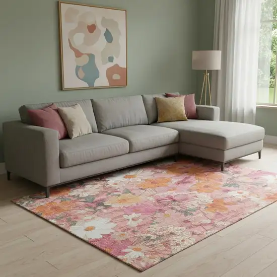 8' Blush Orange And Ivory Floral Washable Area Rug With UV Protection Photo 2