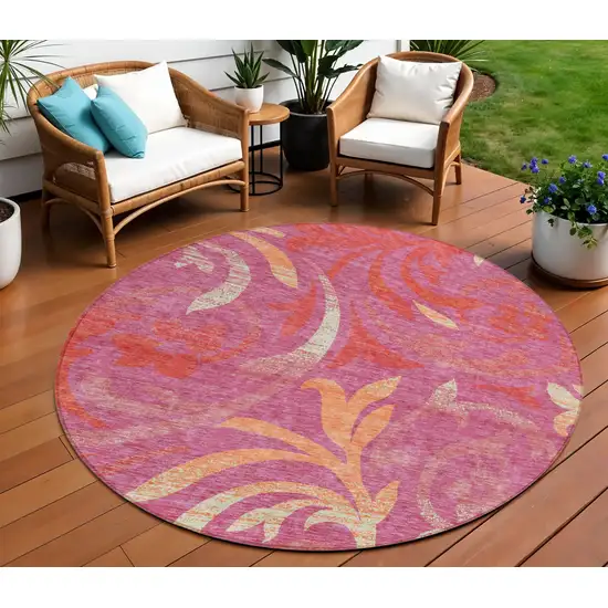 8' Blush Orange And Ivory Round Floral Washable Indoor Outdoor Area Rug Photo 1