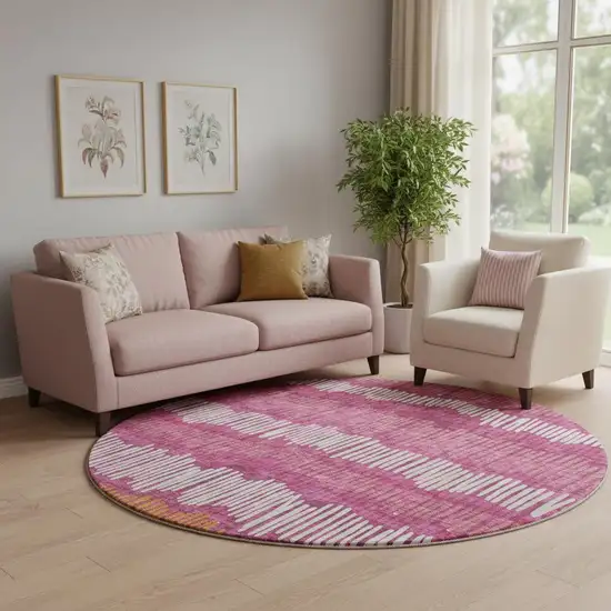 8' Blush Orange And Ivory Striped Washable Round Rug With UV Protection Photo 1