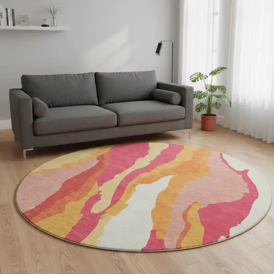 8' Blush Orange And Wheat Abstract Washable Round Rug With UV Protection Photo 2