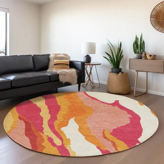 8' Blush Orange And Wheat Abstract Washable Round Rug With UV Protection Photo 4