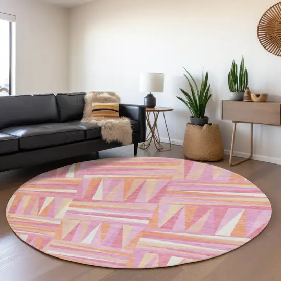 8' Blush Peach And Ivory Geometric Washable Round Rug With UV Protection Photo 4