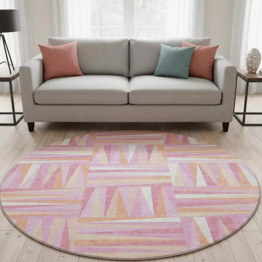 8' Blush Peach And Ivory Geometric Washable Round Rug With UV Protection Photo 2
