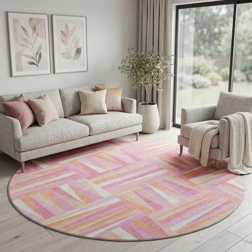 8' Blush Peach And Ivory Geometric Washable Round Rug With UV Protection Photo 1