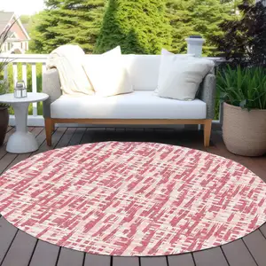 Photo of 8' Blush Pink And Beige Round Abstract Washable Indoor Outdoor Area Rug