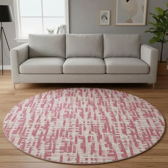 8' Blush Pink And Ivory Abstract Geometric Washable Round Rug With UV Protection Photo 2