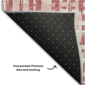 Photo of 8' Blush Pink And Ivory Abstract Geometric Washable Round Rug With UV Protection