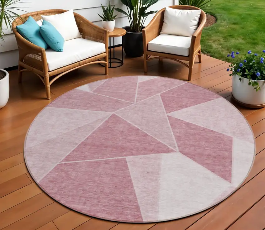 8' Blush Pink And Ivory Round Geometric Washable Indoor Outdoor Area Rug Photo 1