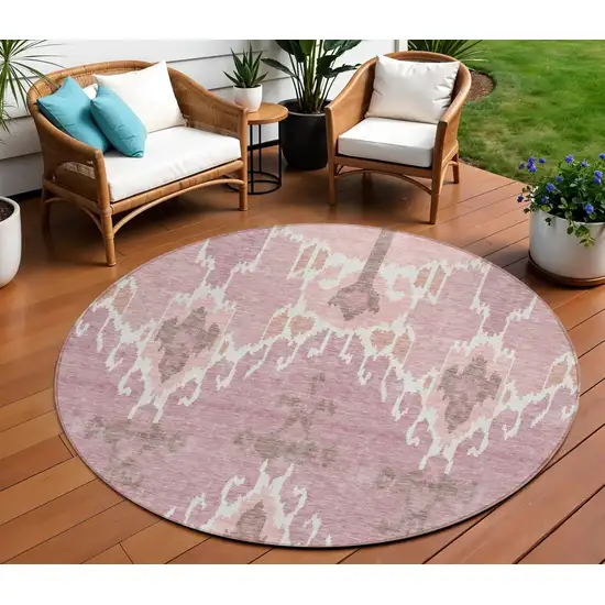 8' Blush Pink And Ivory Round Ikat Washable Indoor Outdoor Area Rug Photo 1