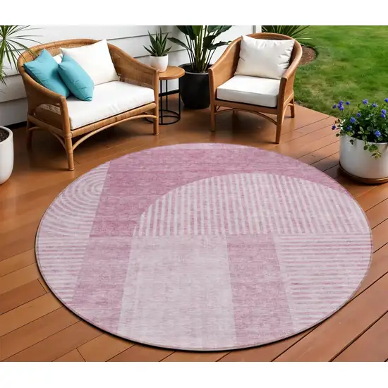 8' Blush Pink And Mauve Round Geometric Washable Indoor Outdoor Area Rug Photo 1