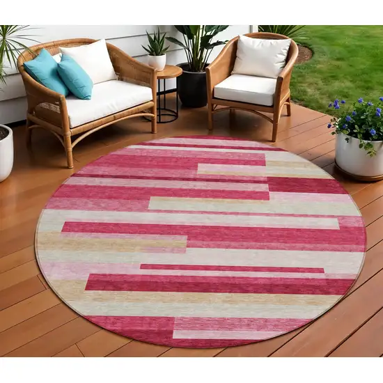 8' Blush Pink And Mauve Round Striped Washable Indoor Outdoor Area Rug Photo 1